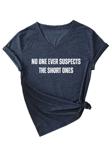 Detail of V-neck T-shirt showing side knot design and the funny slogan print on fabric
