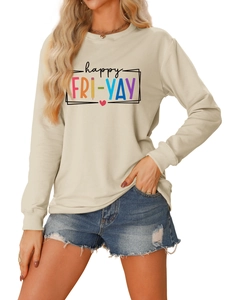 Detail of happy FRI-YAY lettering with pencil and heart icons on beige sweatshirt