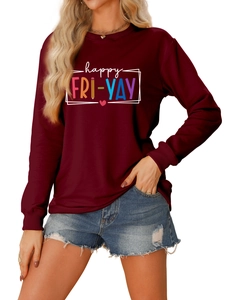 Close-up of wine red sweatshirt with happy fri-yay print and soft cotton texture