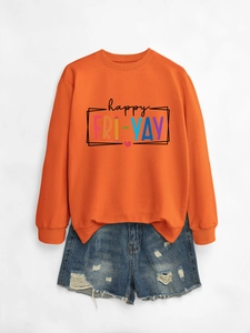 Detailed flat lay of bright orange Happy Fri-yay sweatshirt with colorful lettering print