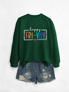 Detailed flat lay of dark green sweatshirt with colorful happy fri yay text and ripped denim shorts
