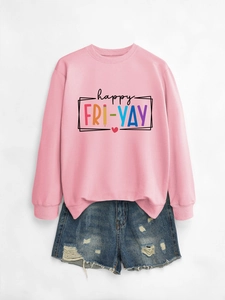 Detail of pink long sleeve sweatshirt with colorful happy fri-yay lettering and denim shorts