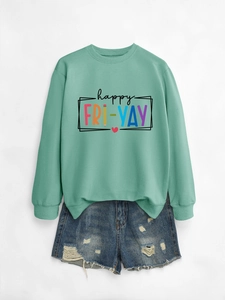 Close-up of mint green happy fri-yay sweatshirt showing ribbed cuffs and printed graphics