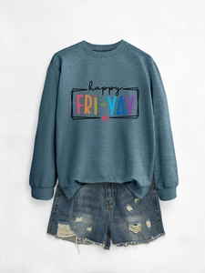 Flat lay of Happy Fri-Yay crewneck sweatshirt paired with distressed denim shorts