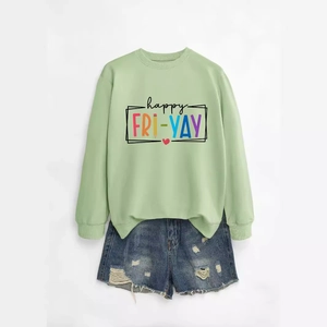 Happy Fri-Yay crewneck sweatshirt in light green paired with distressed denim shorts