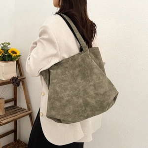 Retro olive green tote bag for women showing large capacity and soft texture