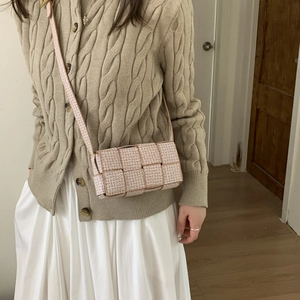 Chic woven flap crossbody bag with monogram pattern for women's casual fashion look