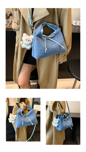 Blue leopard print suede handbag with drawstring bow and cute plush bear charm detail