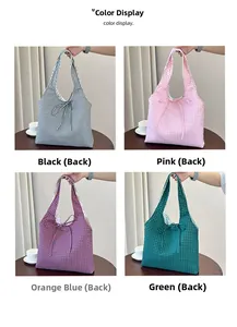 Detail of reversible floral lining and bow tie on grid pattern tote bag in four colors