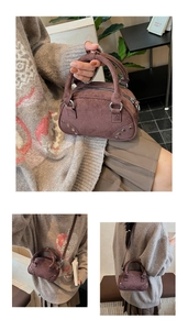 Three-way view of a vintage mini rivet handbag in dark brown suede with round handles