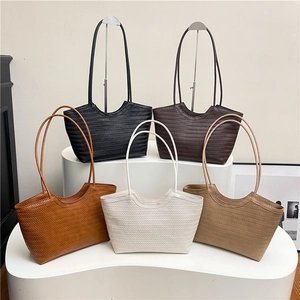 Chic woven tote bags in five versatile colors featuring a stylish herringbone pattern