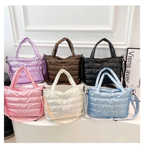 Detailed collection of quilted puffer tote bags in six trendy colors with shoulder straps