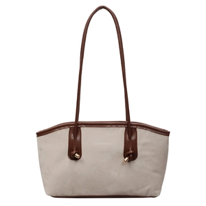 Minimalist light gray tote bag with brown leather trim and fashion lettering print