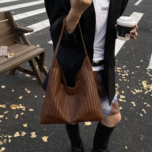 Dark brown woven hobo shoulder bag with herringbone pattern for women fashion 2025
