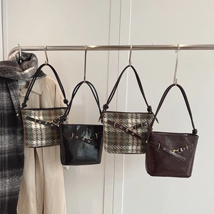 Minimalist bucket shoulder bag in retro plaid fabric and glossy leather options