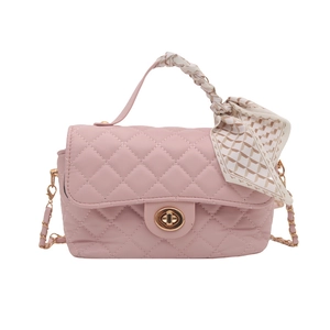 Pink quilted shoulder bag with chain strap and elegant silk scarf wrap handle