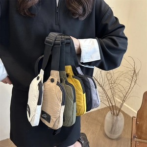 Japanese style minimalist canvas sling bag in various colors for casual daily wear