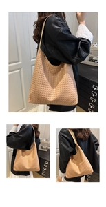 Detailed close-up of light khaki woven hobo bag showcasing intricate leather texture