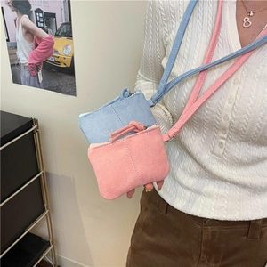 Chic mini suede neck pouches in pink and blue colors with adjustable shoulder straps
