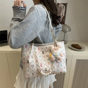 Floral bear print white tote bag with pearl chain strap and plush charm on shoulder