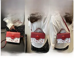 Three ways to wear the cute cherry print crossbody bag: handbag, shoulder, and messenger style