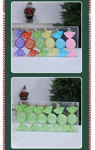 Detailansicht bunter Makronen-Süßigkeiten-Anhänger mit Spiralmuster für den Weihnachtsbaum