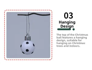 Close-up of a 3cm white Christmas ball with black dots and silver string for tree decor