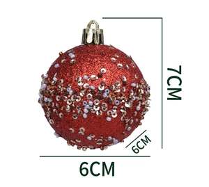 Detail of red glitter Christmas ball ornament with sequins and 7cm height scale