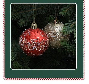 Detailed view of red and gold glitter Christmas balls with sequins on a green pine tree