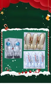 Detail of silver astronaut and zeppelin spaceship Christmas tree ornaments in set