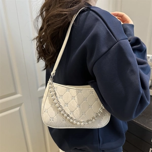 Quilted beige underarm bag with elegant pearl and metal chain straps for women