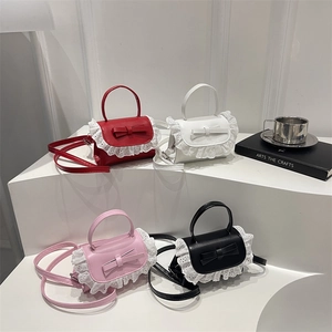 Mini sweet bow handbag in four colors with lace trim and adjustable crossbody strap