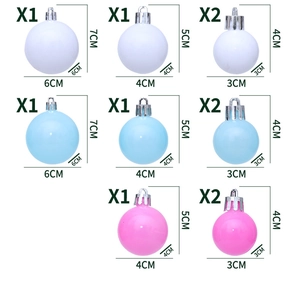 Tableau de comparaison des tailles pour boules de Noël macaron blanc, bleu et rose