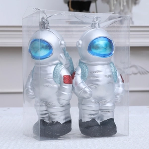 Set of two silver astronaut ornaments in transparent box for Christmas tree decor