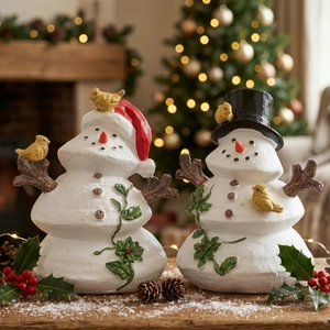 Charming snowman Christmas tabletop ornaments with red hat and black top hat on snow base