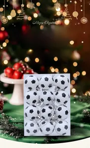 Detailed view of 12-piece football-themed Christmas ornaments with silver hanging strings