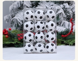 Detail of 12-piece soccer-themed Christmas ornaments in a clear box with festive decor