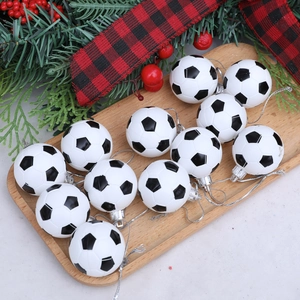 Set of 12 black and white soccer ball Christmas ornaments with silver hanging strings
