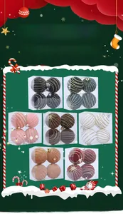 Close-up of 6cm flocked Christmas balls with gold spiral patterns in seven colors
