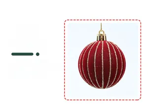 Detailed view of a red flocked Christmas ball ornament with vertical golden glitter stripes