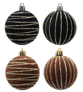 Close-up of black and brown flocked Christmas balls with gold glitter stripe textures