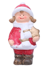 Detail einer Weihnachtsfigur aus Keramik mit roter Mütze und goldenem Sternendekor