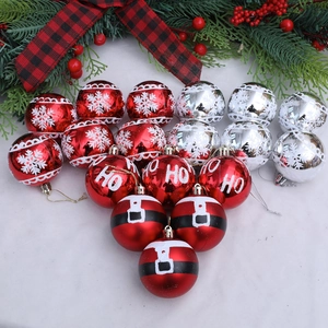 Festive red and silver Christmas ball ornaments with snowflake and Santa belt designs