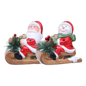 Ceramic Santa and Snowman on wooden sled figurines with green pine needles decoration