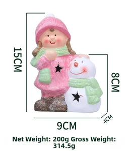 Detailed view of pink Christmas girl and snowman ornament with 15cm height markings