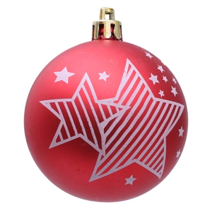 Detalle de bola de Navidad roja con patrones de estrellas blancas y tapa dorada