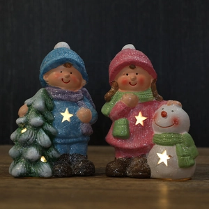 Lighted Christmas ceramic figurines set of a boy with tree and girl with snowman