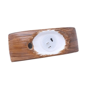 Luminous ceramic boat decor with wood grain base and integrated light toggle switch