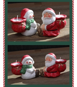 Detail of Santa Claus and Snowman resin candle holders with small white candles