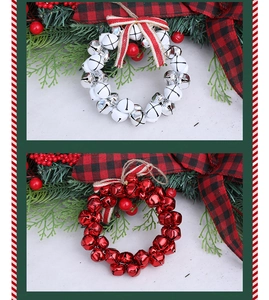 Detailed view of red and white metal Christmas bell wreaths with striped bow decor